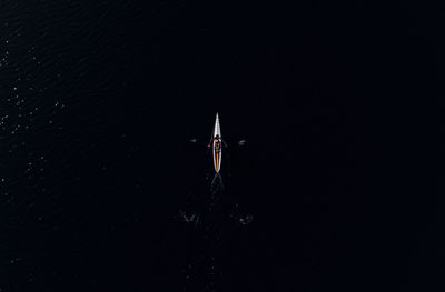 High angle view of ship against black background