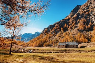 Scenic view of landscape and mountains against sky