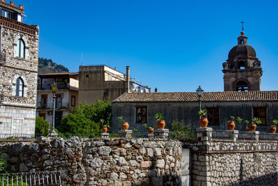 Low angle view of historic building against clear sky