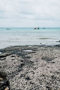 Scenic view of beach against sky