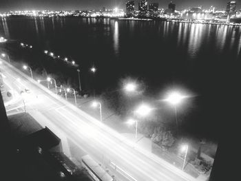 High angle view of light trails on road at night