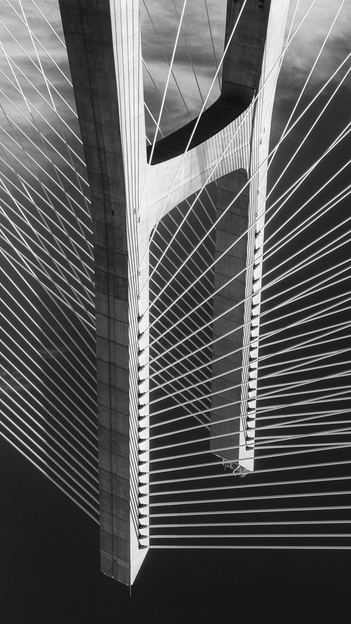 LOW ANGLE VIEW OF BUILDING SEEN THROUGH WINDOW