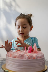 Asian cute little princess at 3rd birthday party.