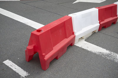 High angle view of red umbrella on road