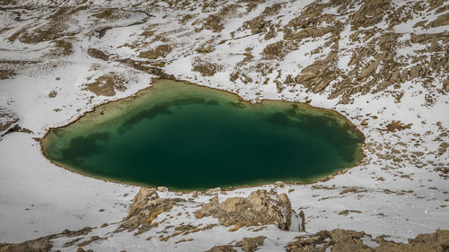 High angle view of snow covered land