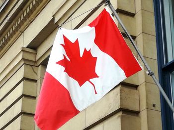 Low angle view of flag on building