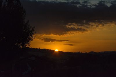 Scenic view of silhouette landscape against sky during sunset