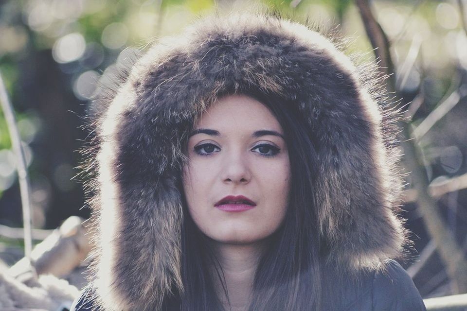 headshot, young adult, portrait, person, looking at camera, young women, lifestyles, focus on foreground, long hair, front view, smiling, leisure activity, close-up, head and shoulders, casual clothing, brown hair, human face