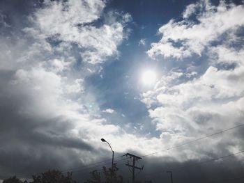 Low angle view of street light against sky