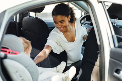 Woman sitting in car