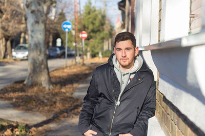 Young man standing outdoors