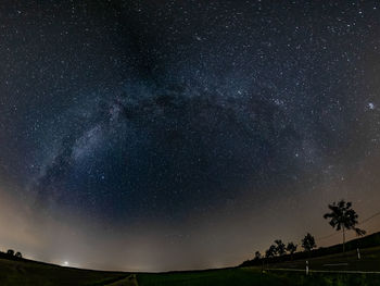 Low angle view of star field against sky at night with the milkyway