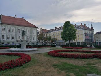 Buildings in city against sky