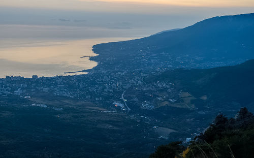 High angle view of mountain against sky during sunset