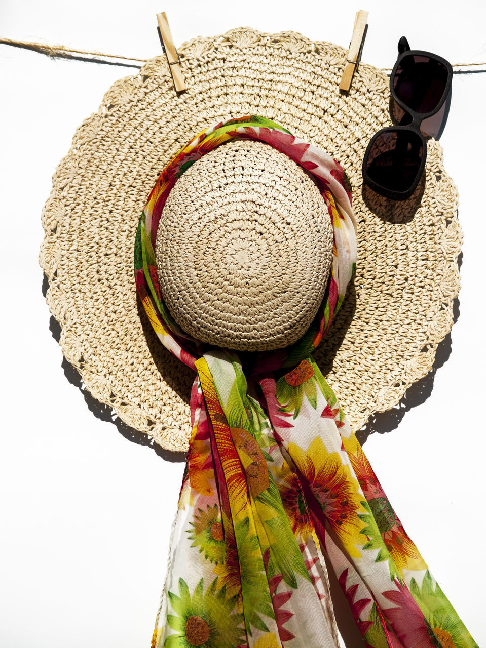 CLOSE-UP OF HAT WITH UMBRELLA