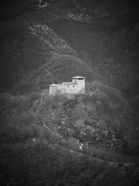 Abandoned house on field