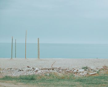 Scenic view of beach against clear sky