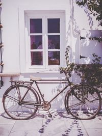 Bicycle parked in front of house