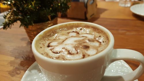 High angle view of cappuccino on table