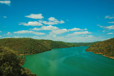 Scenic view of bay against sky