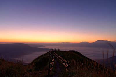 Scenic view of mountains against sky during sunset