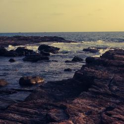 Scenic view of sea at sunset