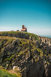 Scenic view of sea against clear blue sky