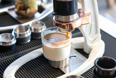 High angle view of coffee cups on table