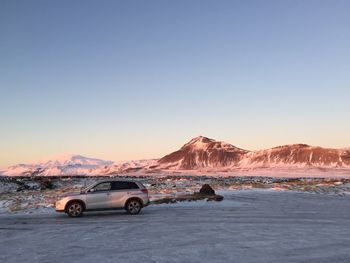 View of car on land against clear sky