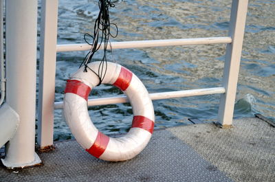 Close-up of rope tied to railing