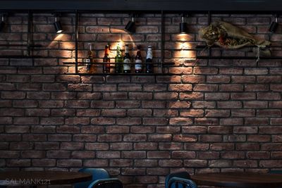 Street light against wall at night