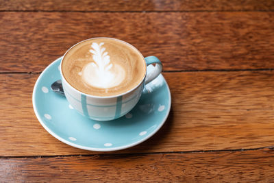 Coffee cup on table