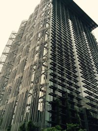 Low angle view of modern building against sky