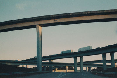 Low angle view of bridge against clear sky