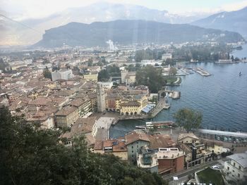High angle view of townscape and mountains