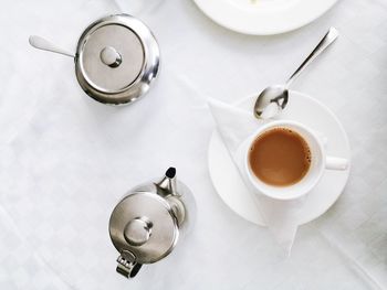 High angle view of coffee cup on table