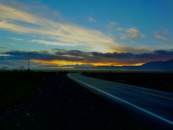 Empty road at sunset