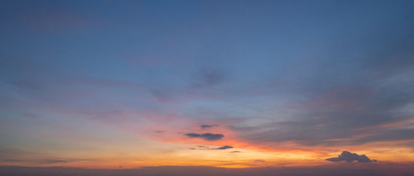 Low angle view of dramatic sky during sunset