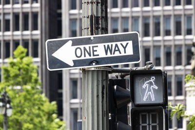 Information sign on road in city