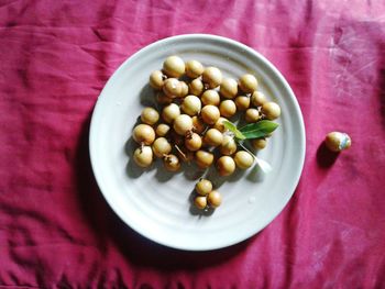 High angle view of fruits in plate on table