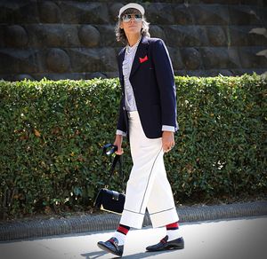 Woman wearing sunglasses standing outdoors