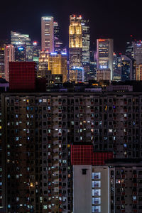 Illuminated buildings in city at night