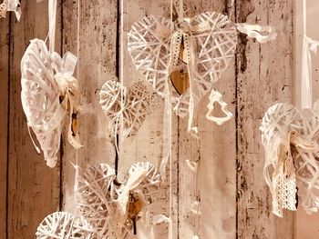 Close-up of clothes hanging on wood