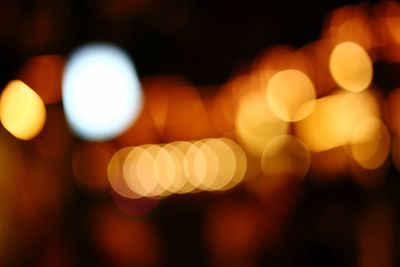 Defocused image of illuminated lights at night