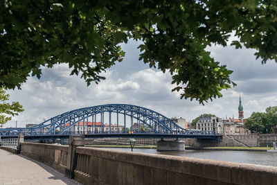 Bridge over river against sky