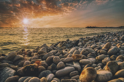 Scenic view of sea against sky during sunset