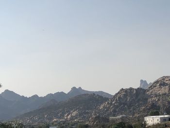 View of mountain range against clear sky