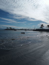 Scenic view of beach against sky