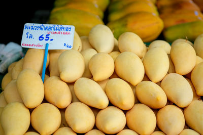 Close-up of oranges for sale at market stall