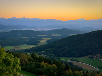 Scenic view of mountains against sky during sunset